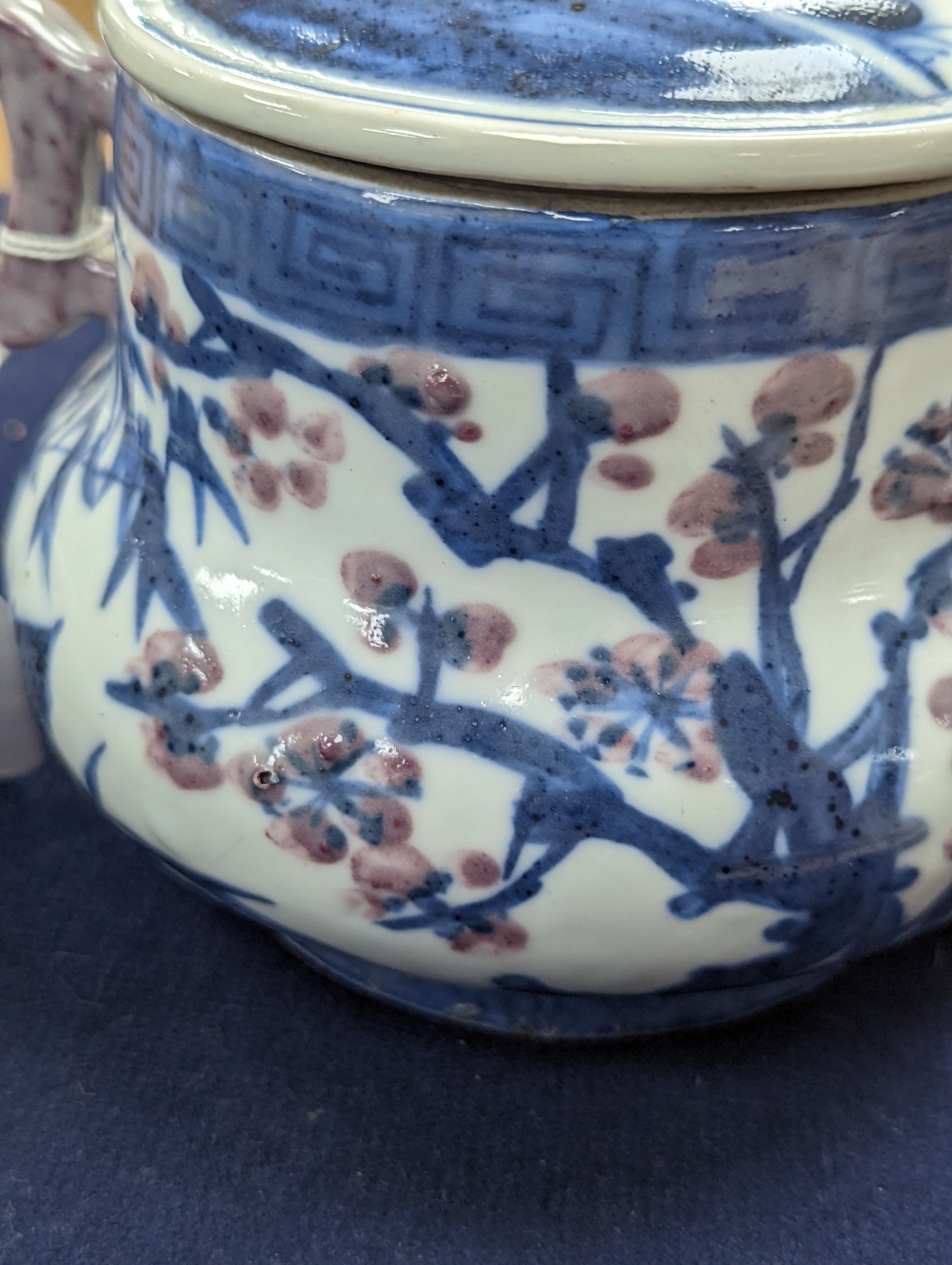 A Chinese underglaze blue and copper red jar and cover, Xuande six character mark but later 12cm